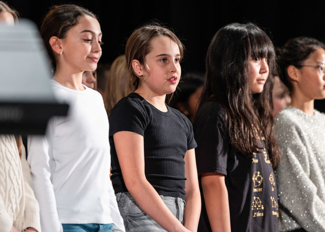 groups of kids who are looking forward and participating in the orchestra